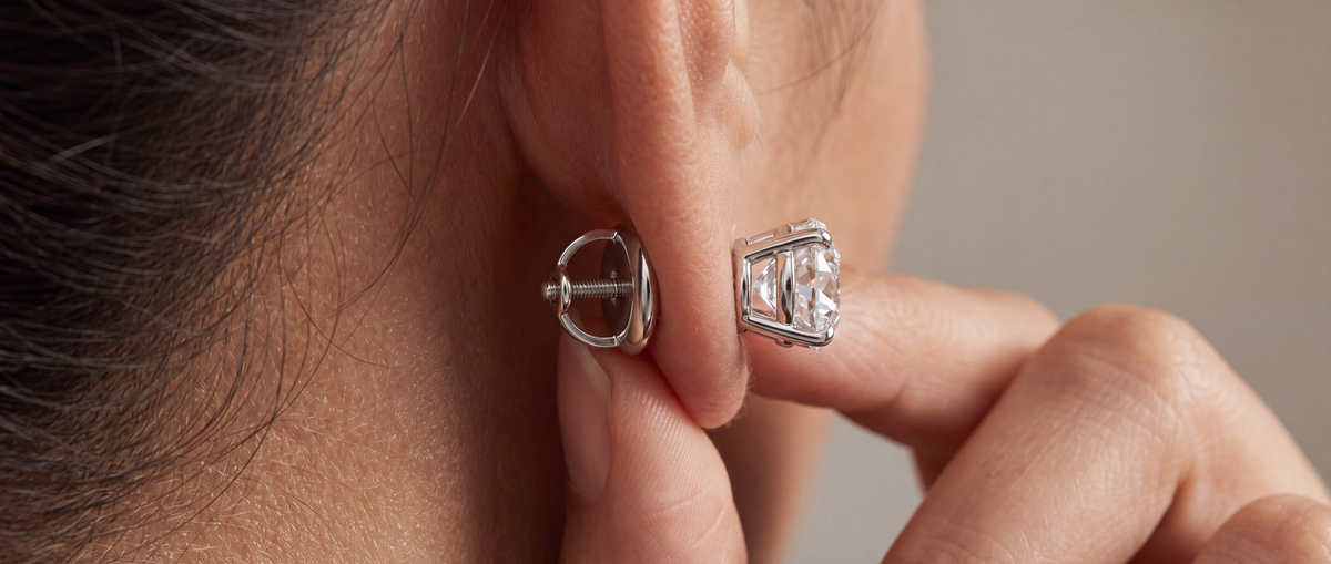 An Image Showing a Woman Wearing a Lab Grown Diamond Stud Earring