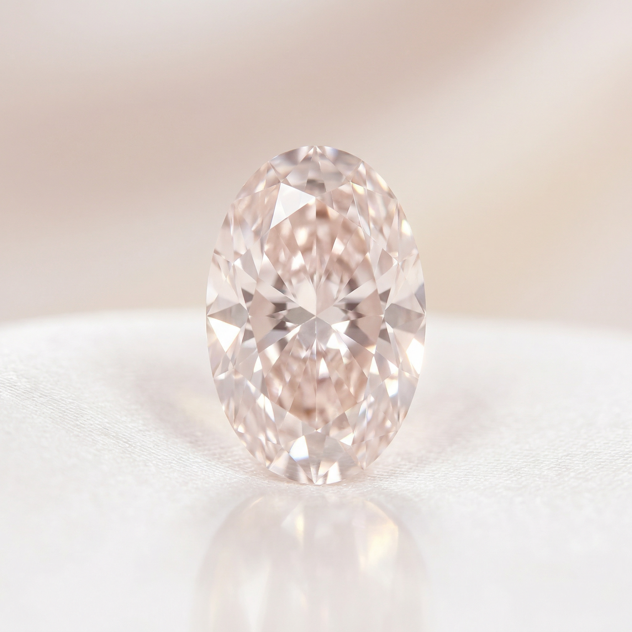 Pale Pink Oval Cut Diamond