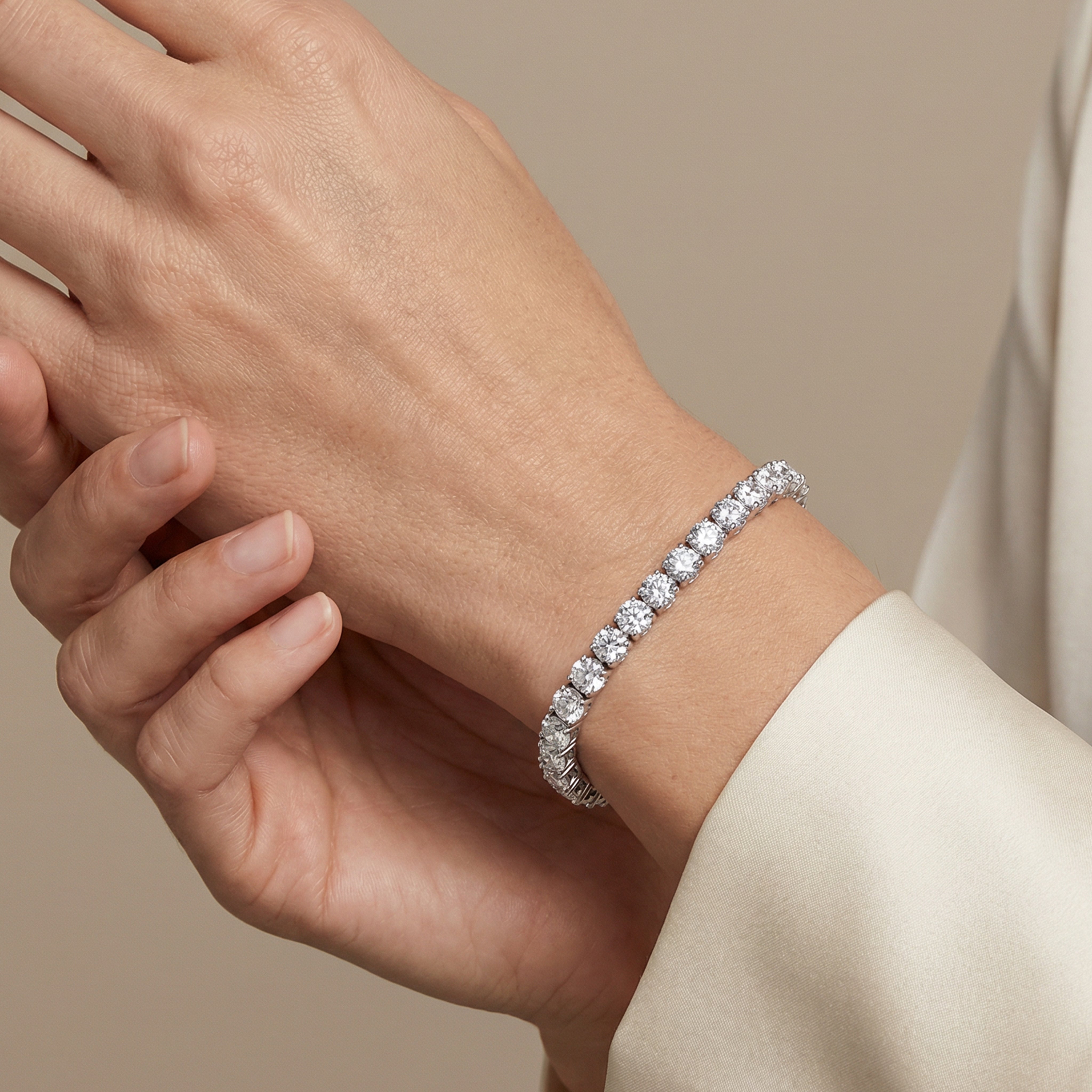 20 carat round lab grown diamond tennis bracelet in 14k white gold on wrist by Michael Gabriels