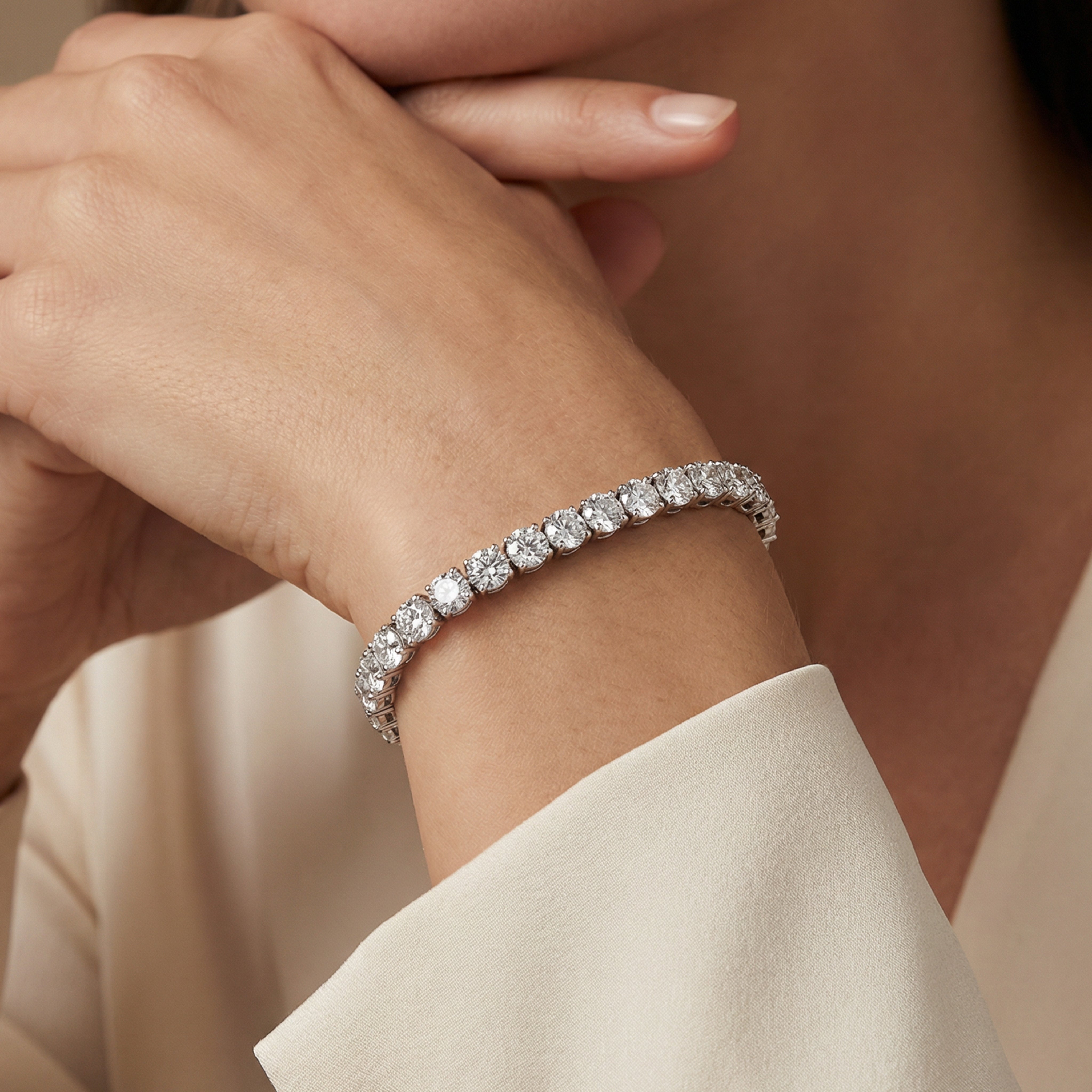 28 carat round lab grown diamond tennis bracelet in 14k white gold on wrist by Michael Gabriels