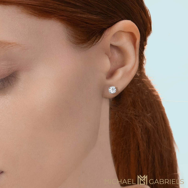 1 Carat Round Lab Grown Diamond Stud Earrings In Ear