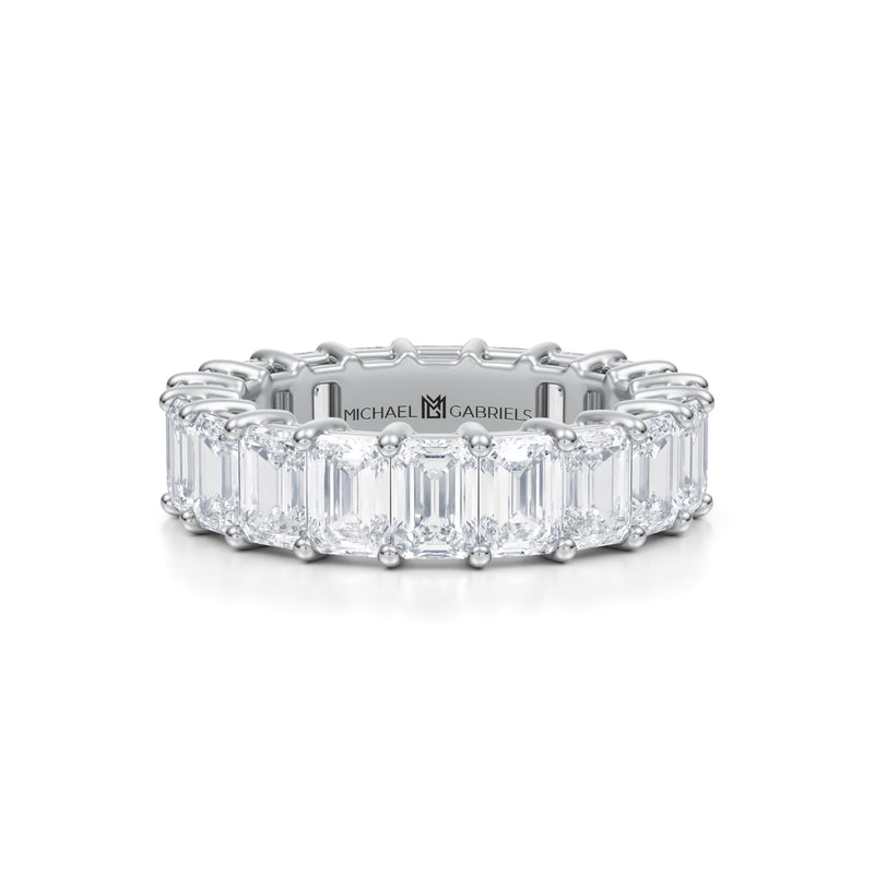 Emerald eternity band in white gold.