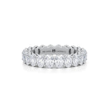 Petite lab-grown diamond eternity band in white gold.
