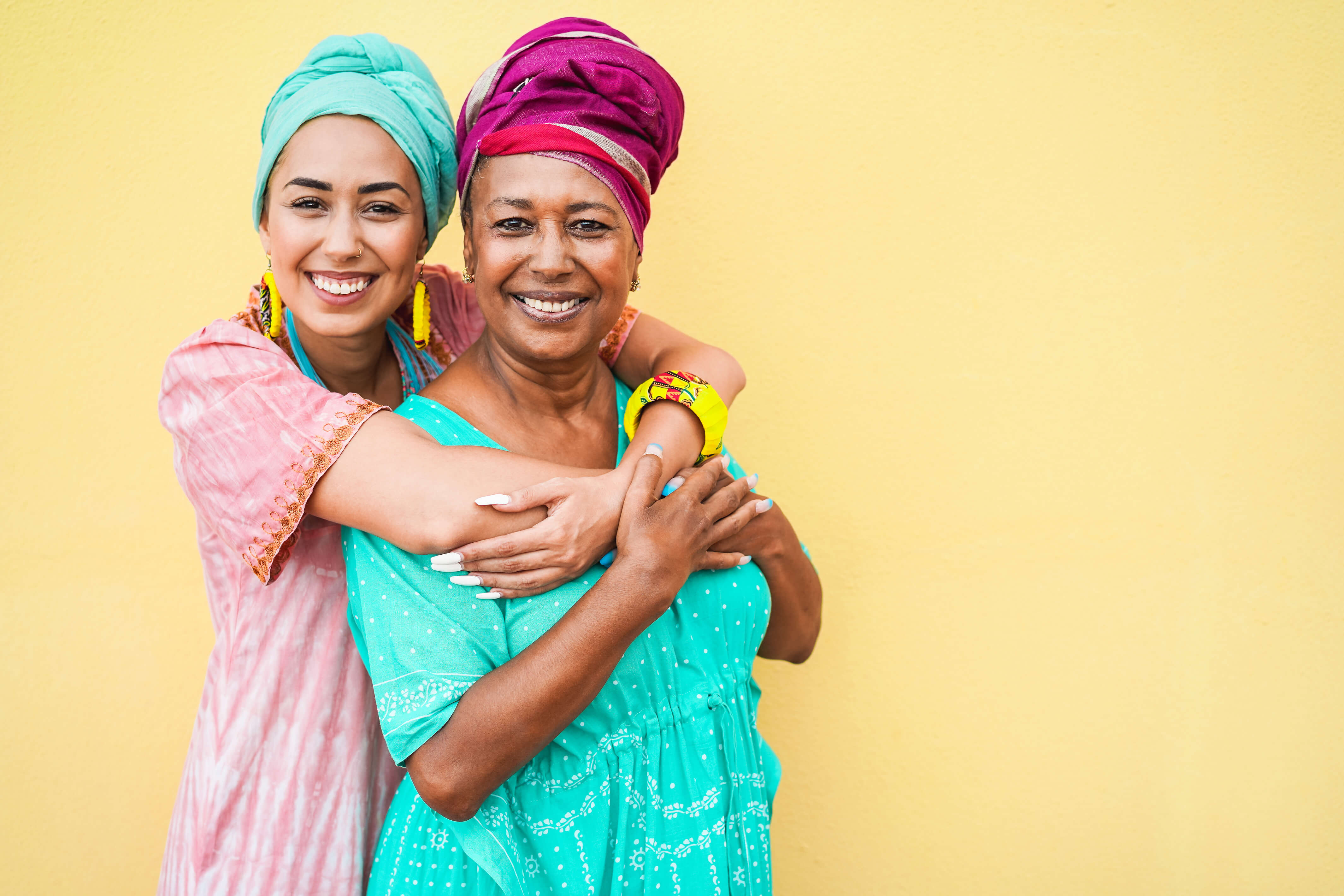 Daughter hugging Mother