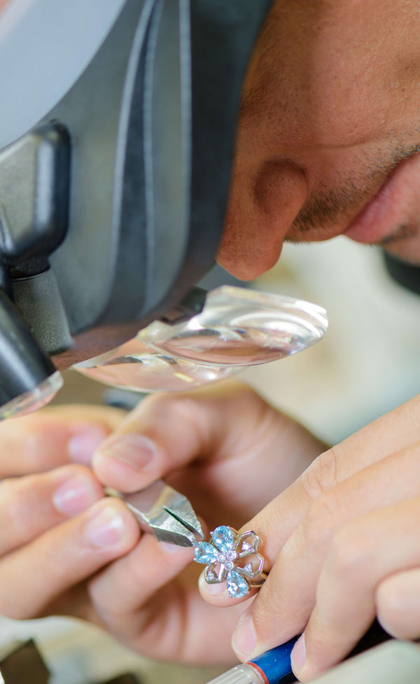 A jeweler working with lab grown diamonds