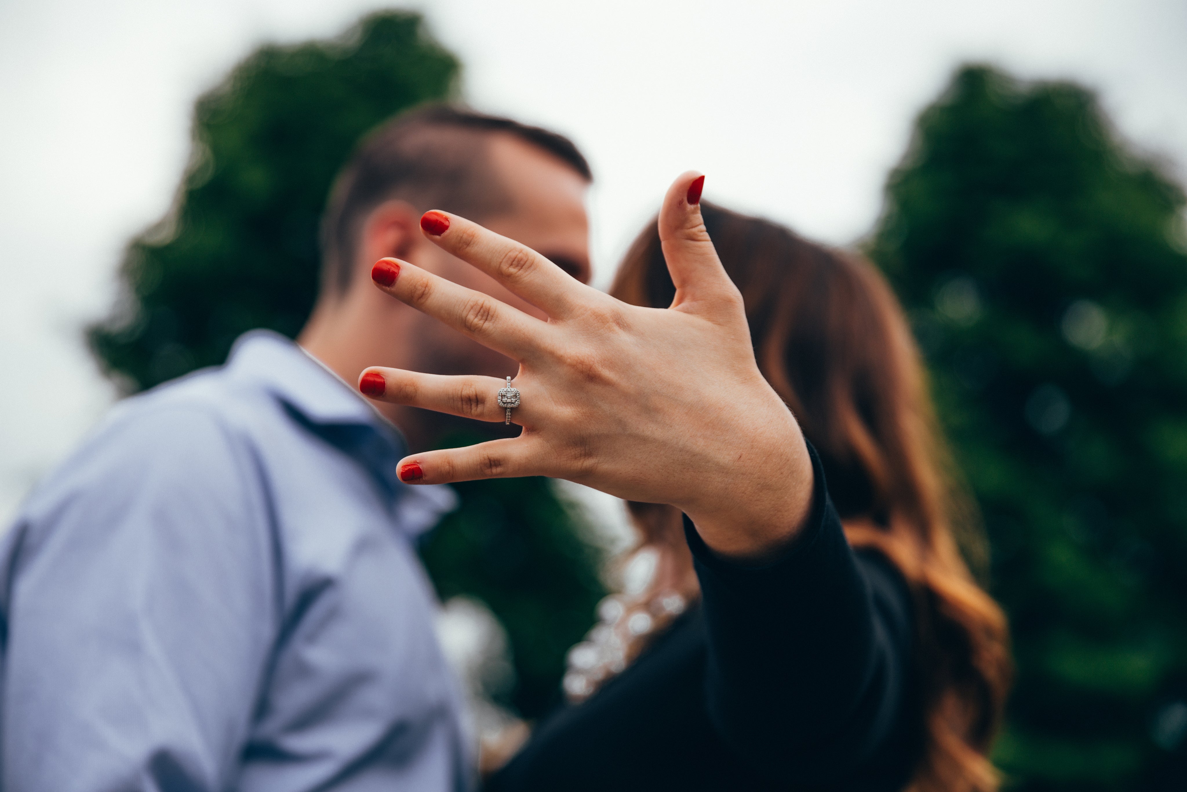 Woman showing her Lab Grown Diamond Engagement Ring