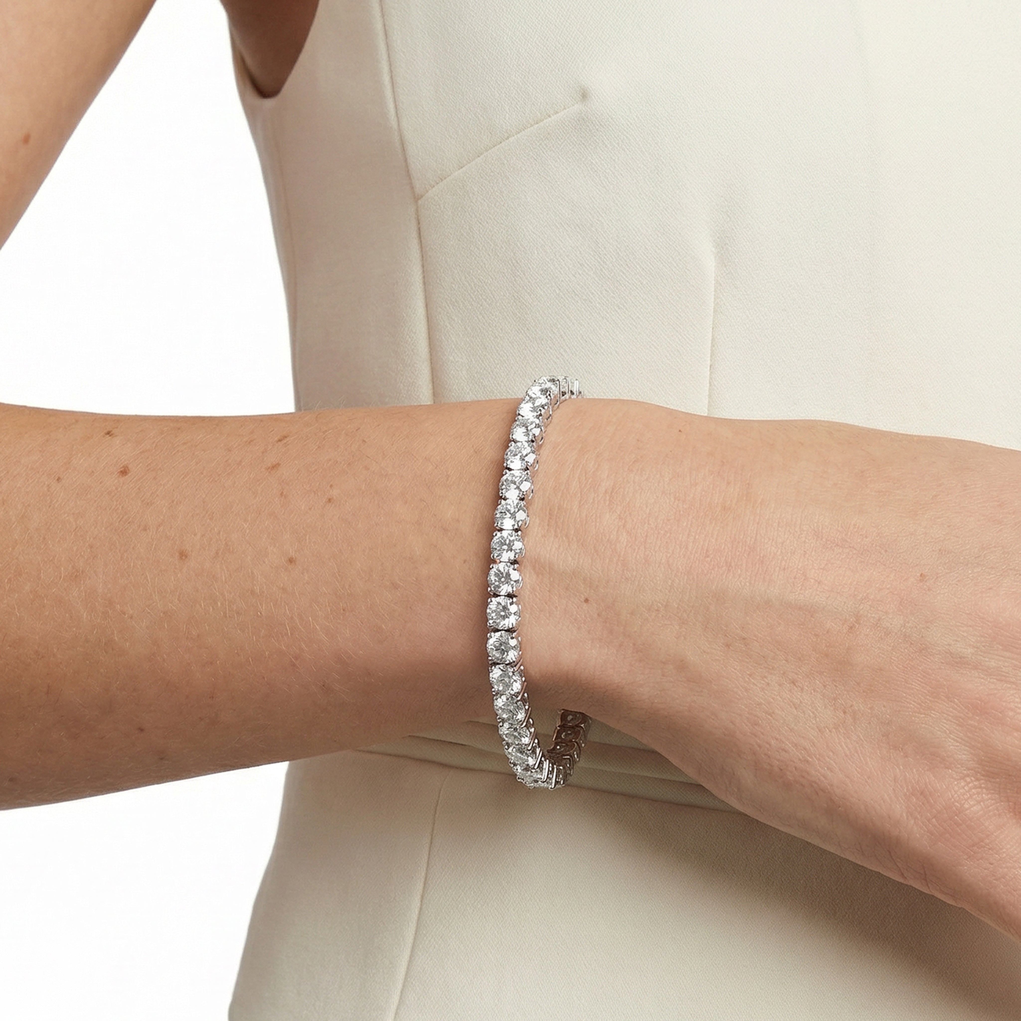 17 carat round lab grown diamond tennis bracelet in 14k white gold on wrist by Michael Gabriels