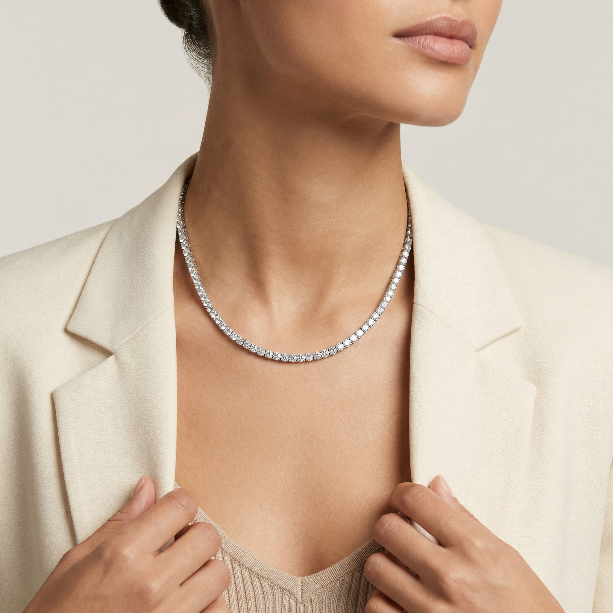18 carat round lab grown diamond tennis necklace in 14k white gold on neck by Michael Gabriels