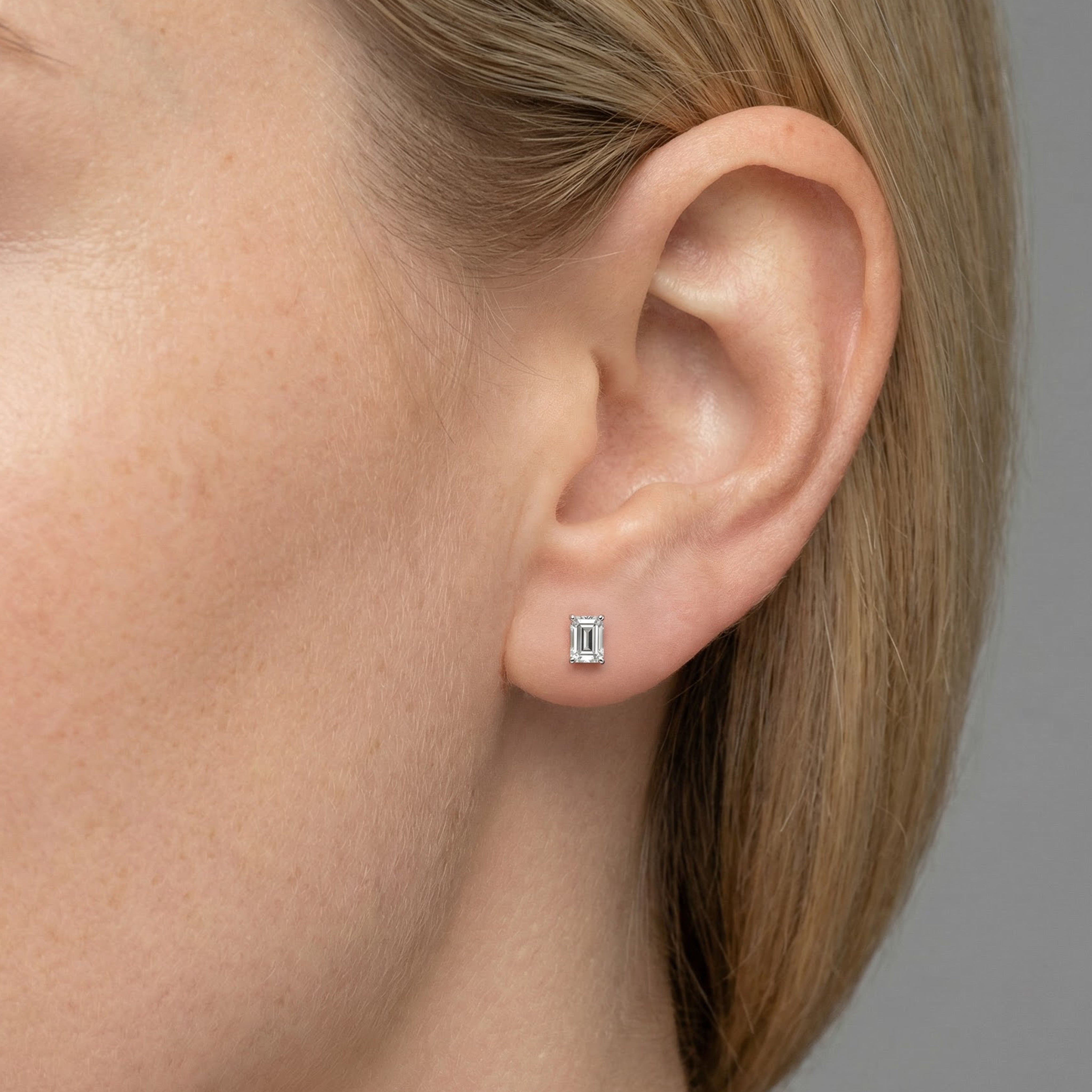 1 carat emerald lab grown diamond stud earring in 14k white gold on ear by Michael Gabriels