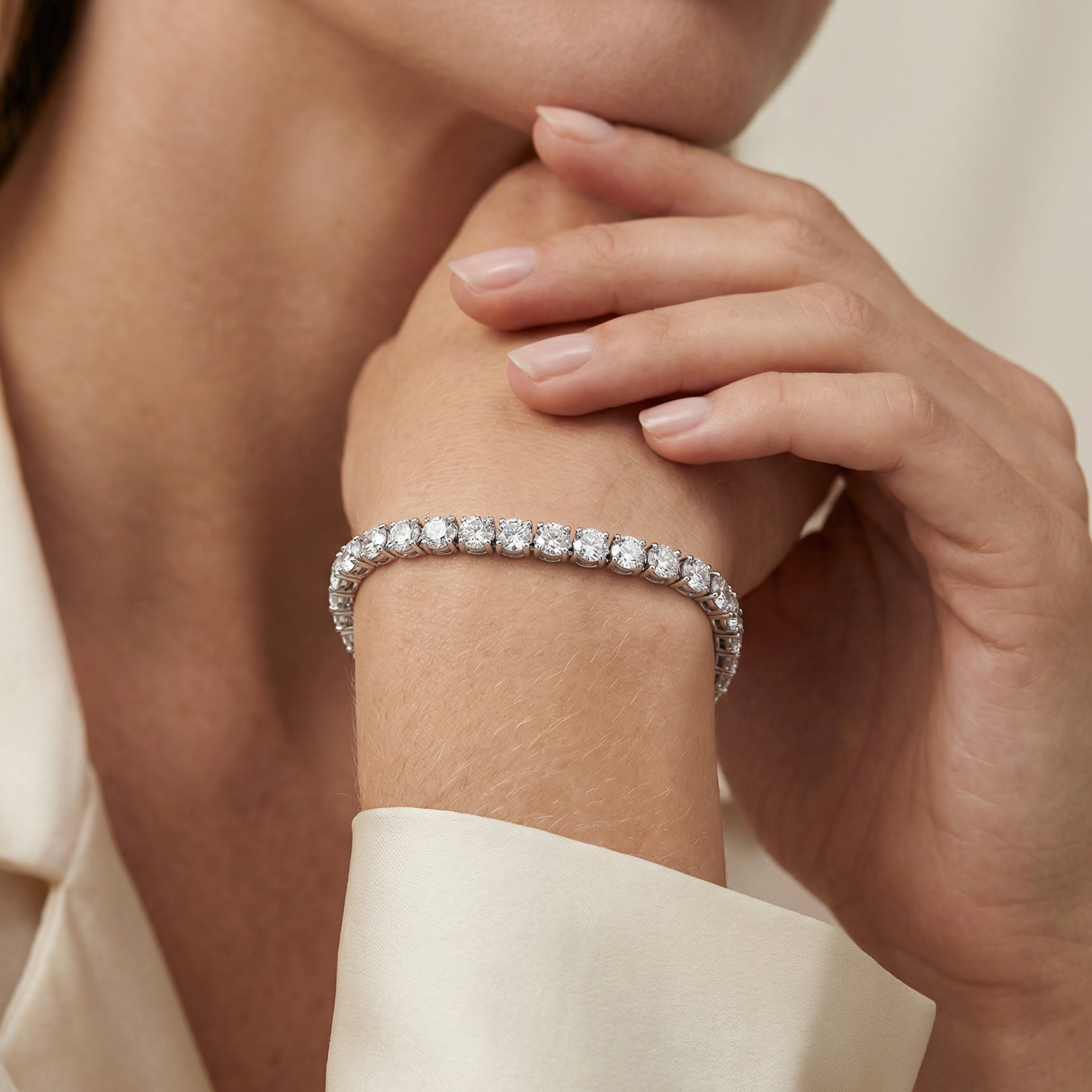 22 carat round lab grown diamond tennis bracelet in 14k white gold on wrist by Michael Gabriels