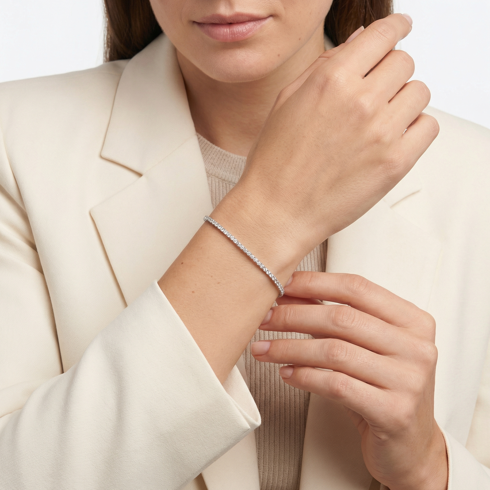 2 carat round lab grown diamond tennis bracelet in 14k white gold on wrist by Michael Gabriels