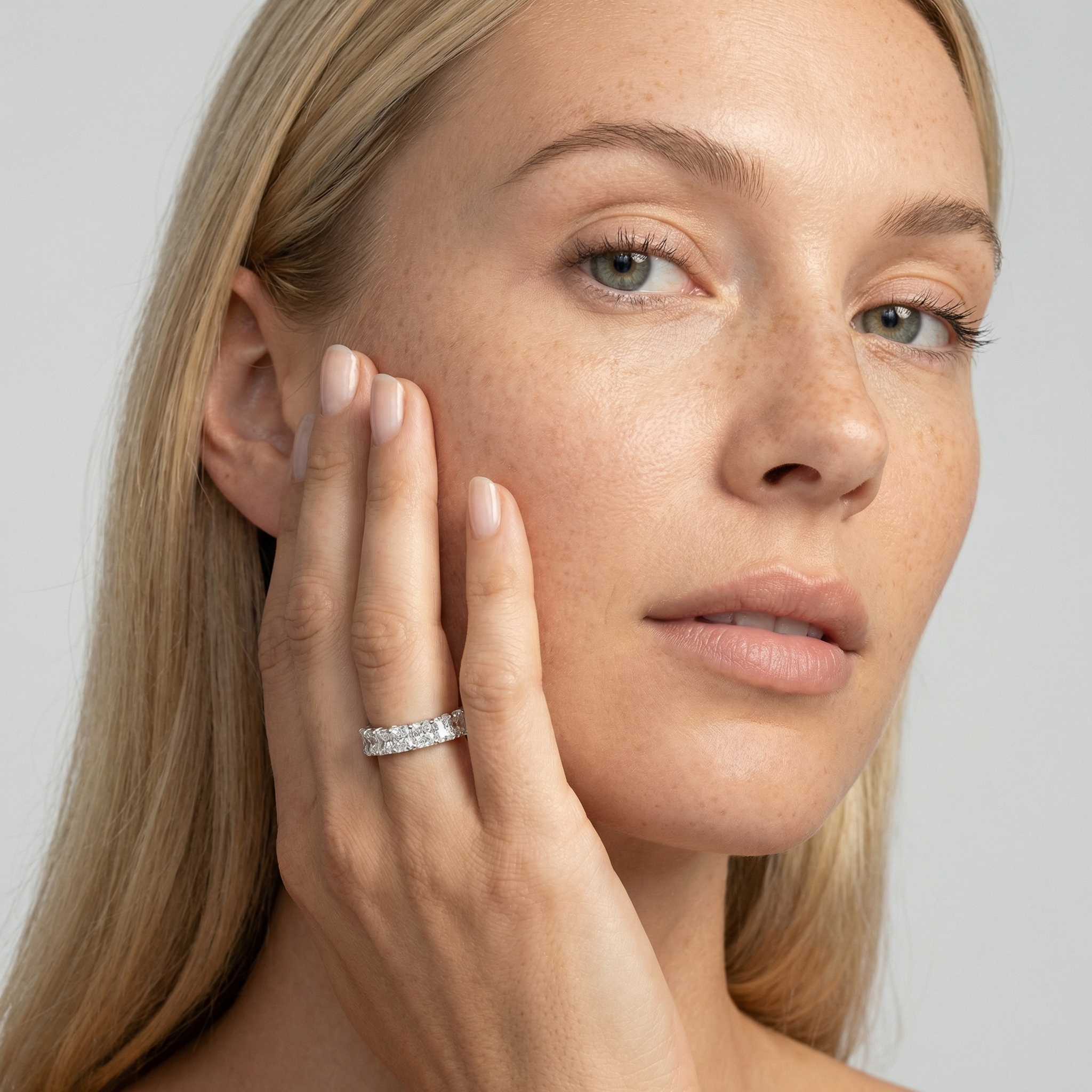 6 carat radiant lab grown diamond basket eternity band in 14k white gold on finger by Michael Gabriels