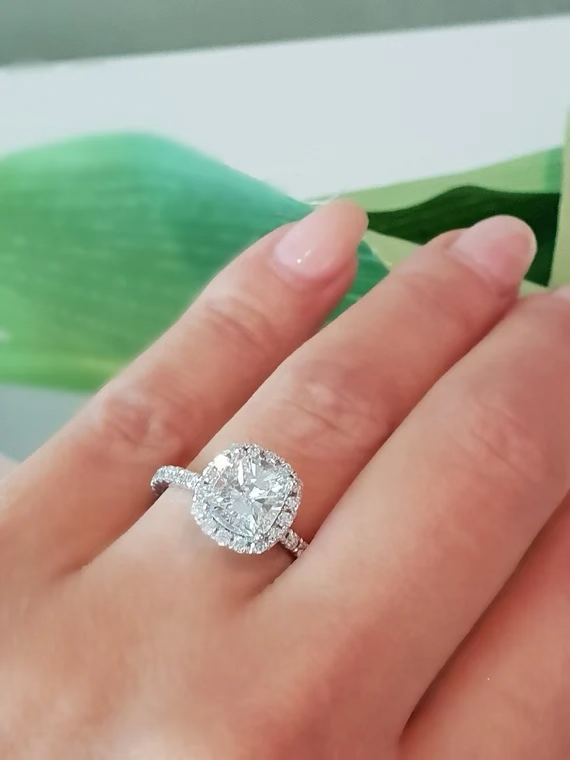 cushion 2.40 G Vs1 with diamonds halfway with halo $3800 PC