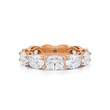 Rose gold eternity band with lab-grown diamonds in horizontal oval shape.
