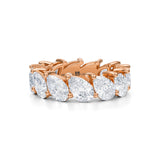 Rose gold eternity band with slanted pear lab-grown diamonds.