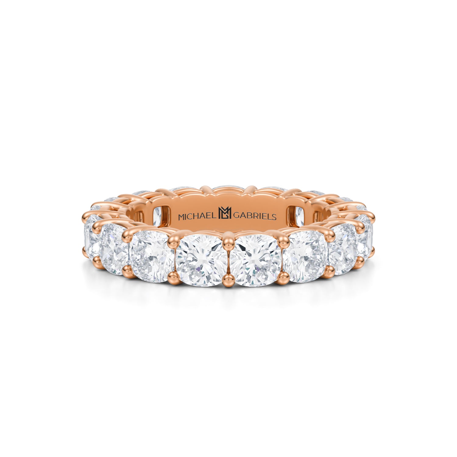 Rose gold eternity band with cushion cut lab grown diamonds.