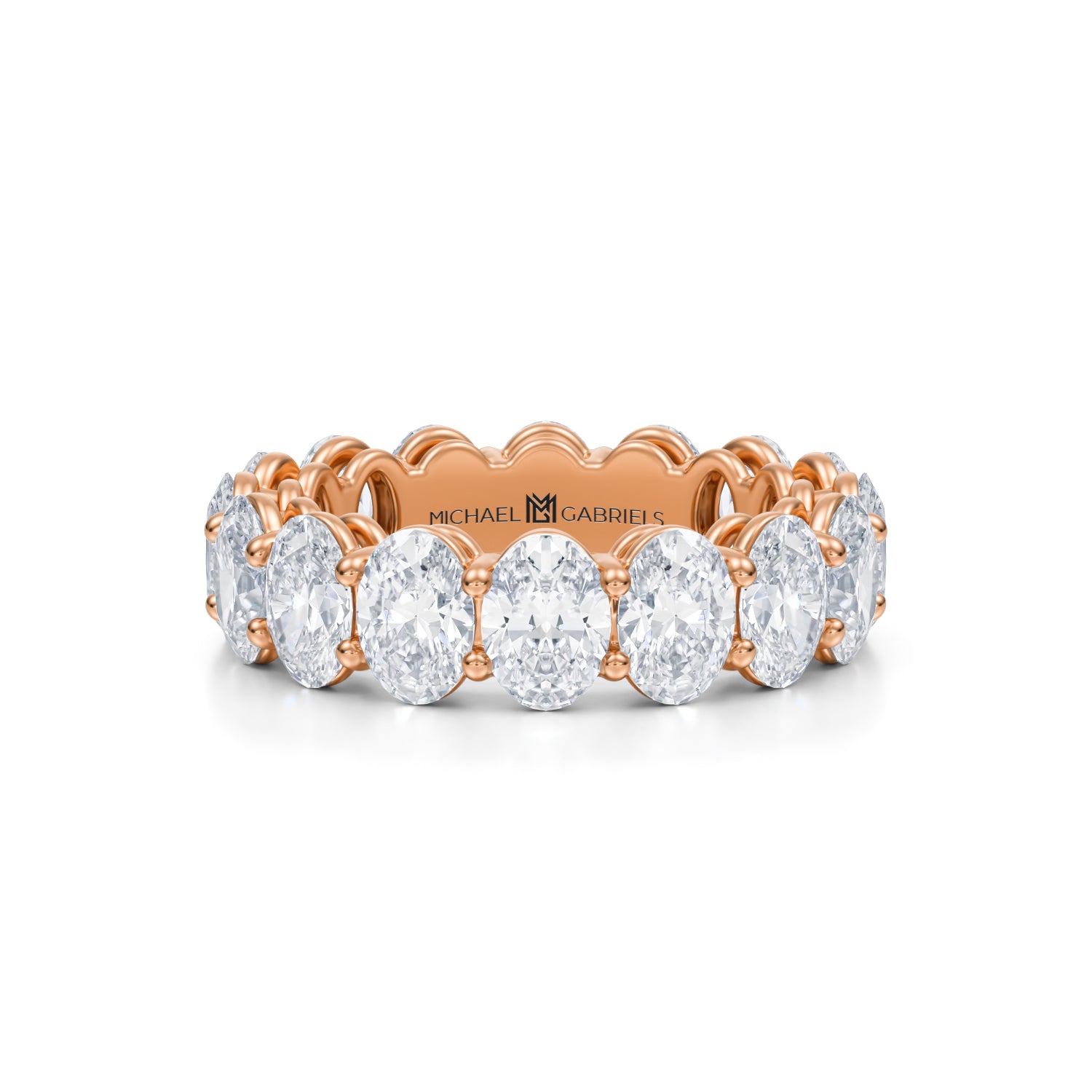 Rose gold eternity band with lab-grown diamonds in vertical oval shape.