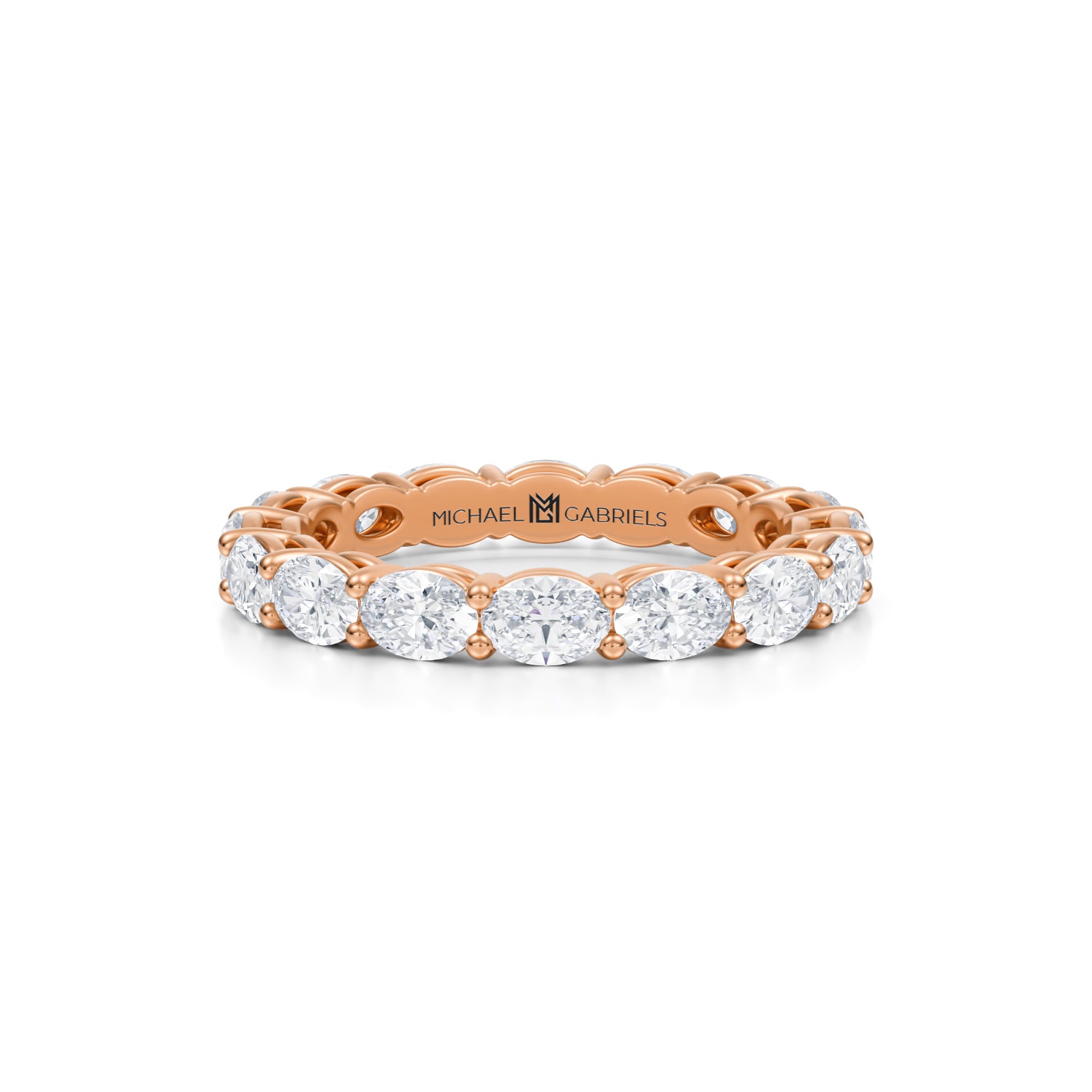 Rose gold eternity band with lab-grown diamonds in petite oval shape.