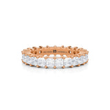 Rose gold eternity band with princess cut lab grown diamonds.