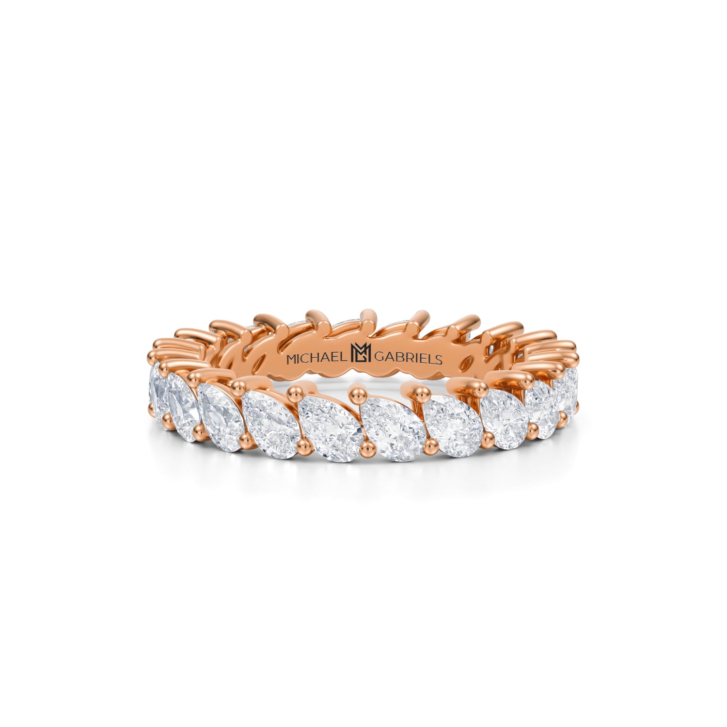 Rose gold eternity band with slanted pear lab-grown diamonds.