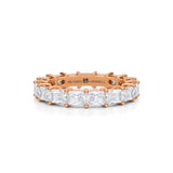 Rose gold eternity band with lab-grown diamonds.