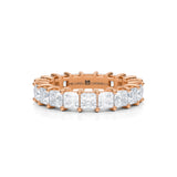 Rose gold eternity band with princess cut lab grown diamonds.