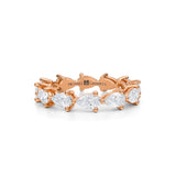 Rose gold eternity band with small lab-grown diamonds.