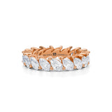 Rose gold eternity band with slanted pear lab-grown diamonds.