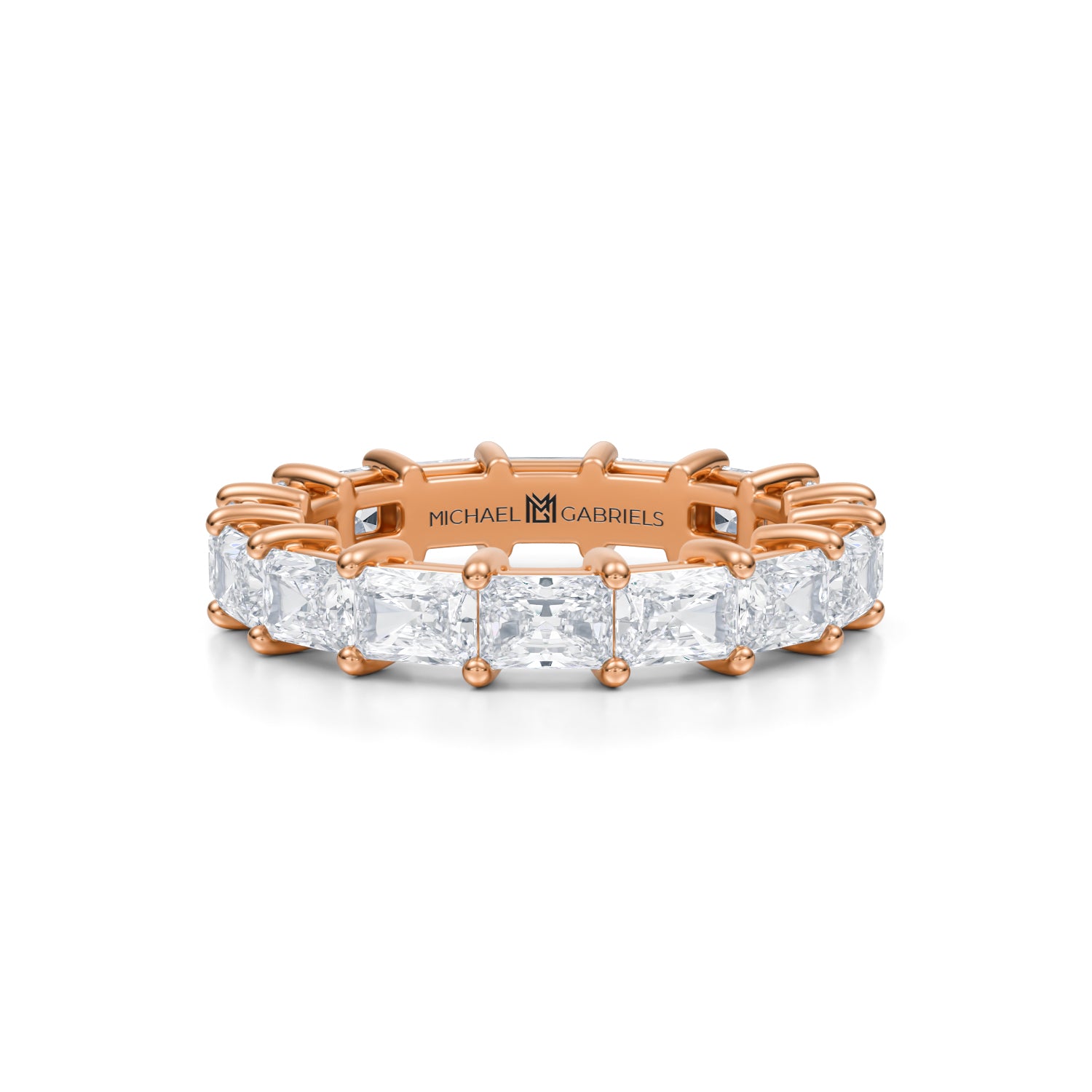 Rose gold eternity band with lab-grown diamonds.