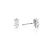 Lab-grown diamond stud earrings in white gold, 3/4 carat marquise cut.