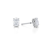 White gold earrings with 1.5 carat oval lab grown diamonds.