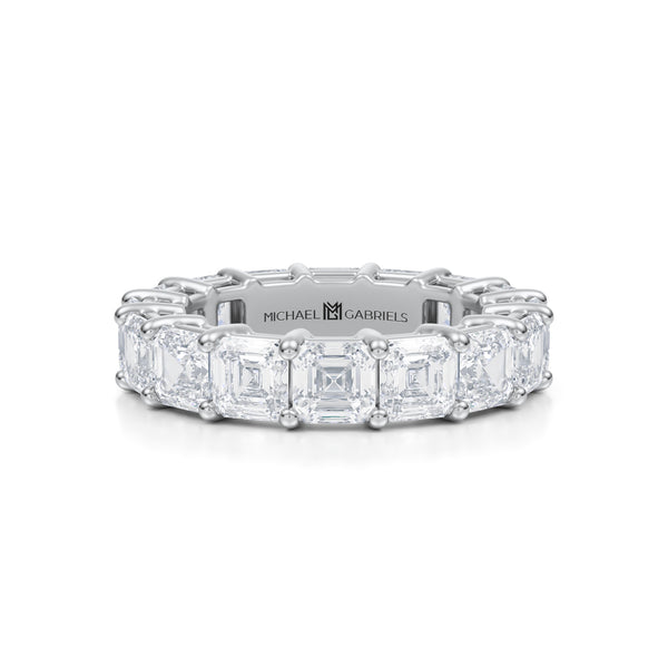 White gold eternity band with asscher cut lab grown diamonds.
