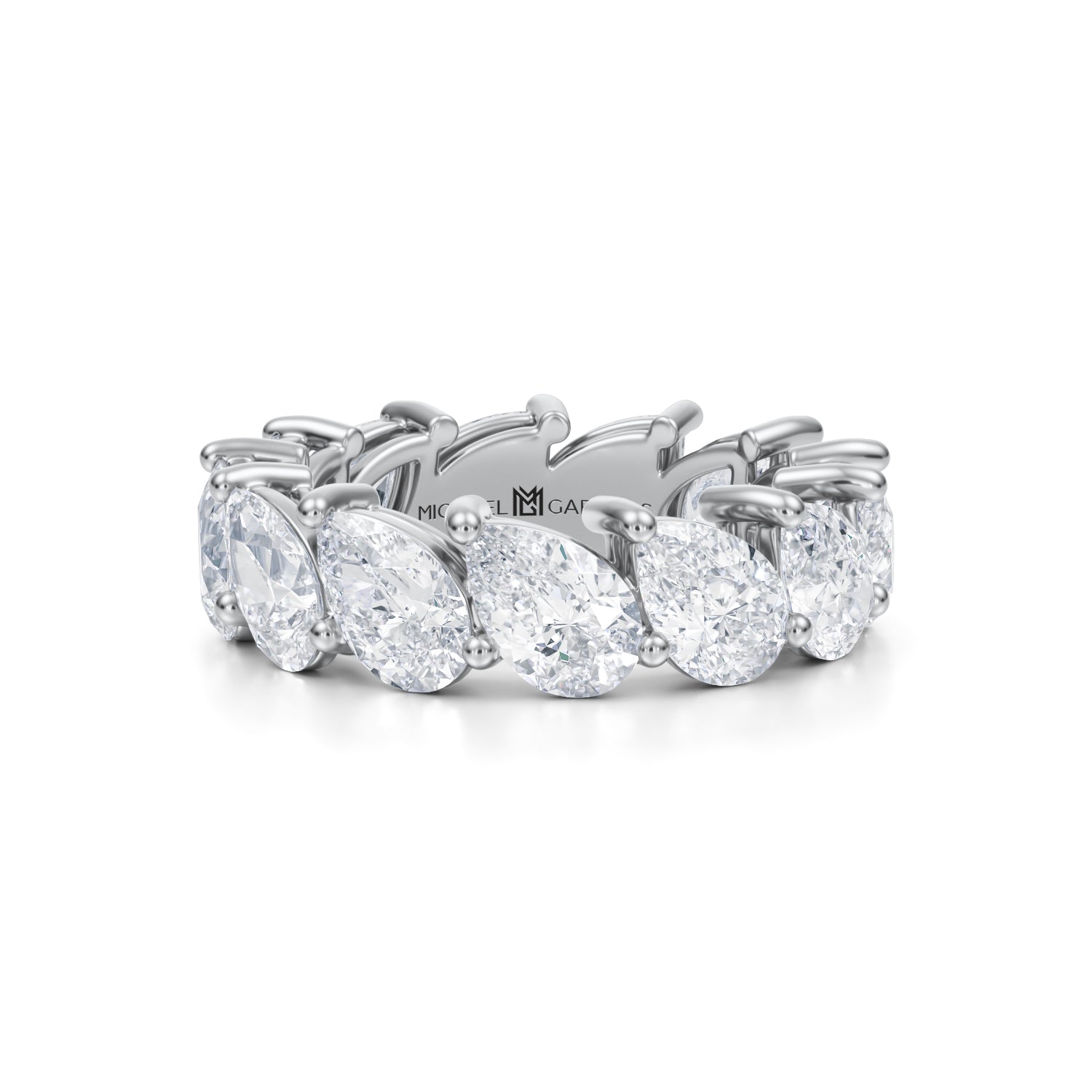 Slanted pear diamond eternity band in white gold.