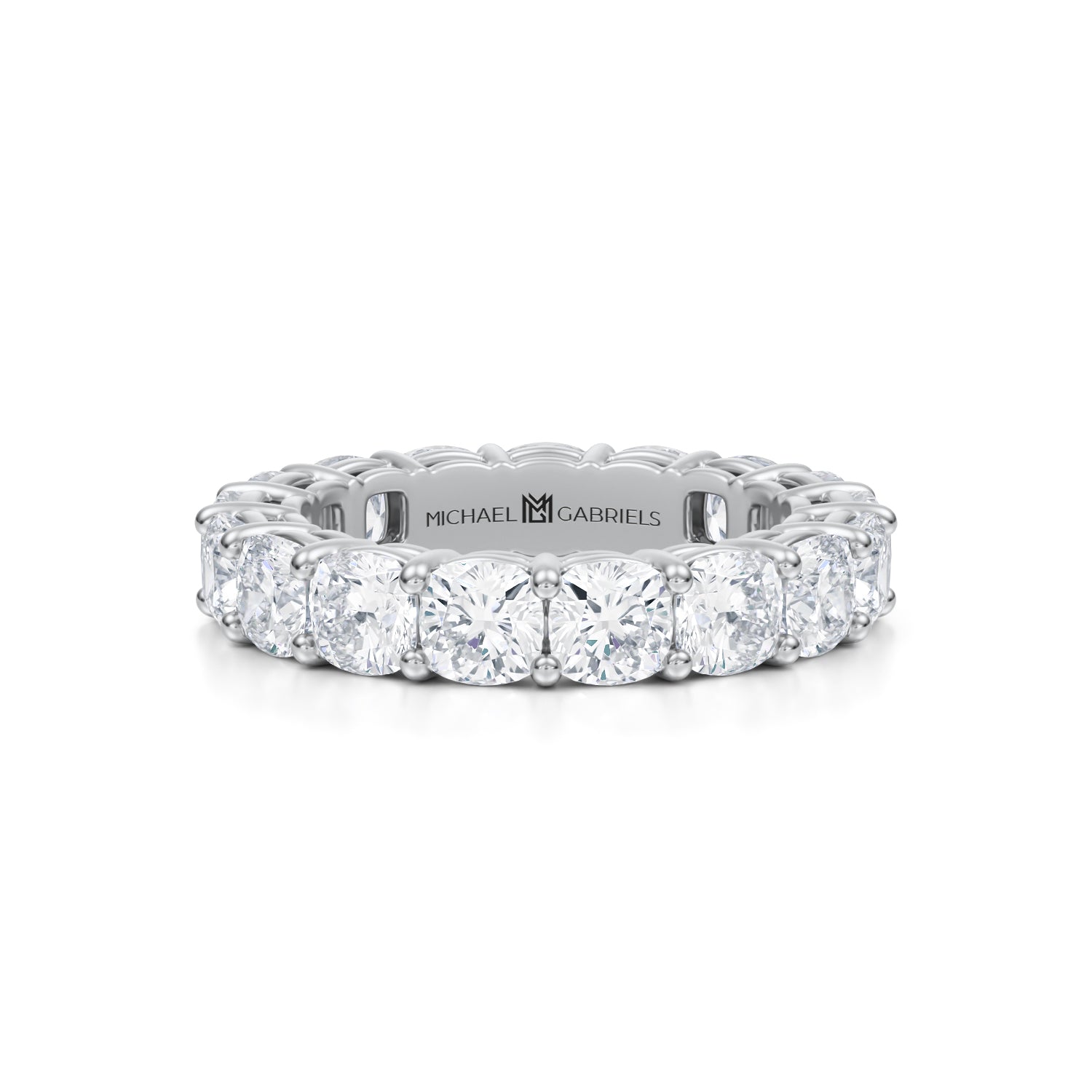 White gold eternity band with cushion cut lab grown diamonds.