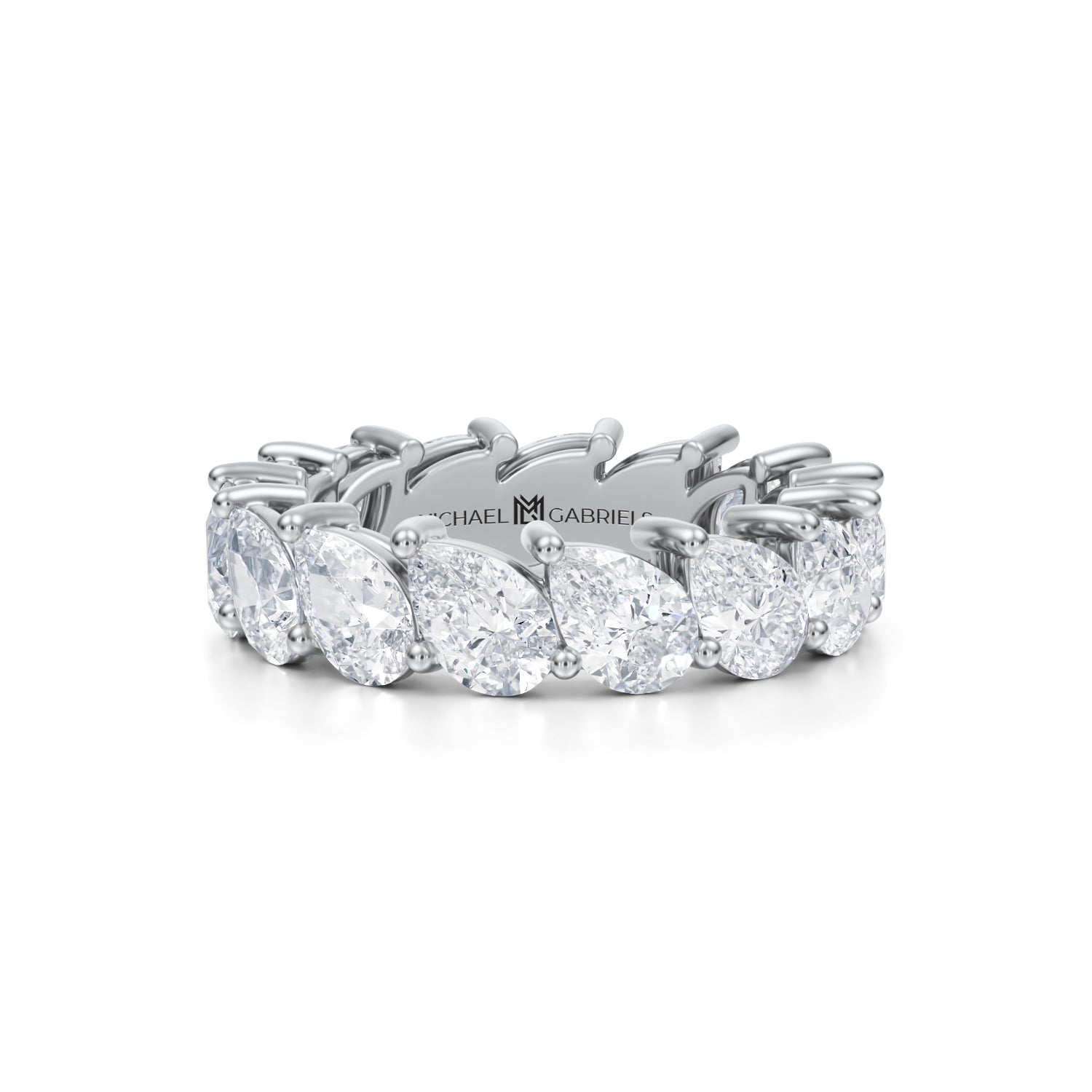 Slanted pear diamond eternity band in white gold.