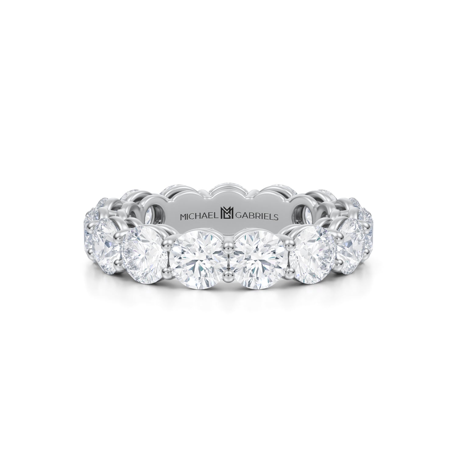 White gold eternity band with lab-grown diamonds.