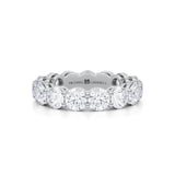 White gold eternity band with lab-grown diamonds.