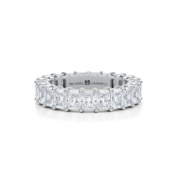 Petite white gold eternity band with vertical radiant lab-grown diamonds.