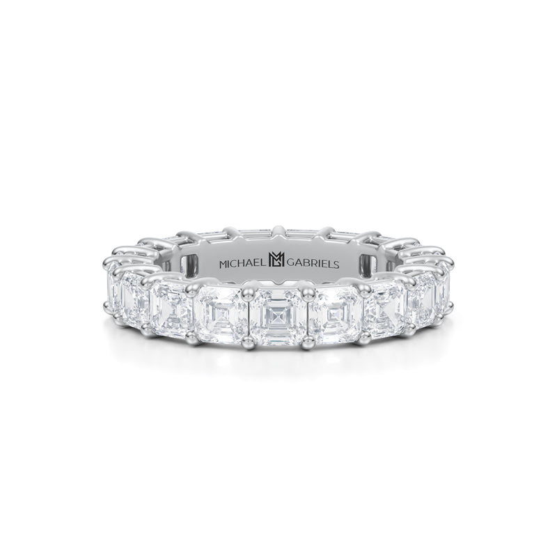 White gold eternity band with Asscher cut lab grown diamonds.