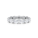 Small lab-grown diamond eternity band in white gold.