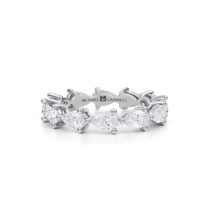 White gold eternity band with lab-grown pear diamonds.