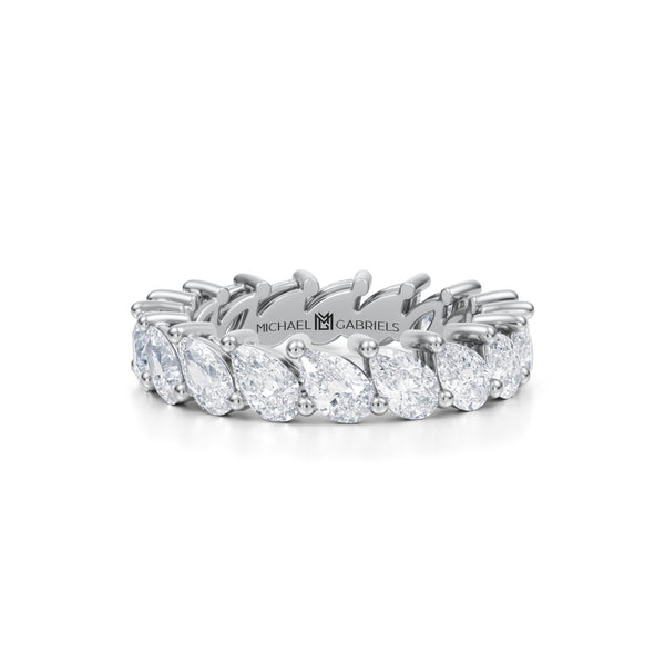 Slanted pear diamond eternity band in white gold.