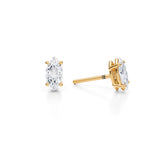 Lab-grown diamond stud earrings, 1 carat, in yellow gold.