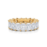 Radiant lab-grown diamond eternity band in yellow gold.