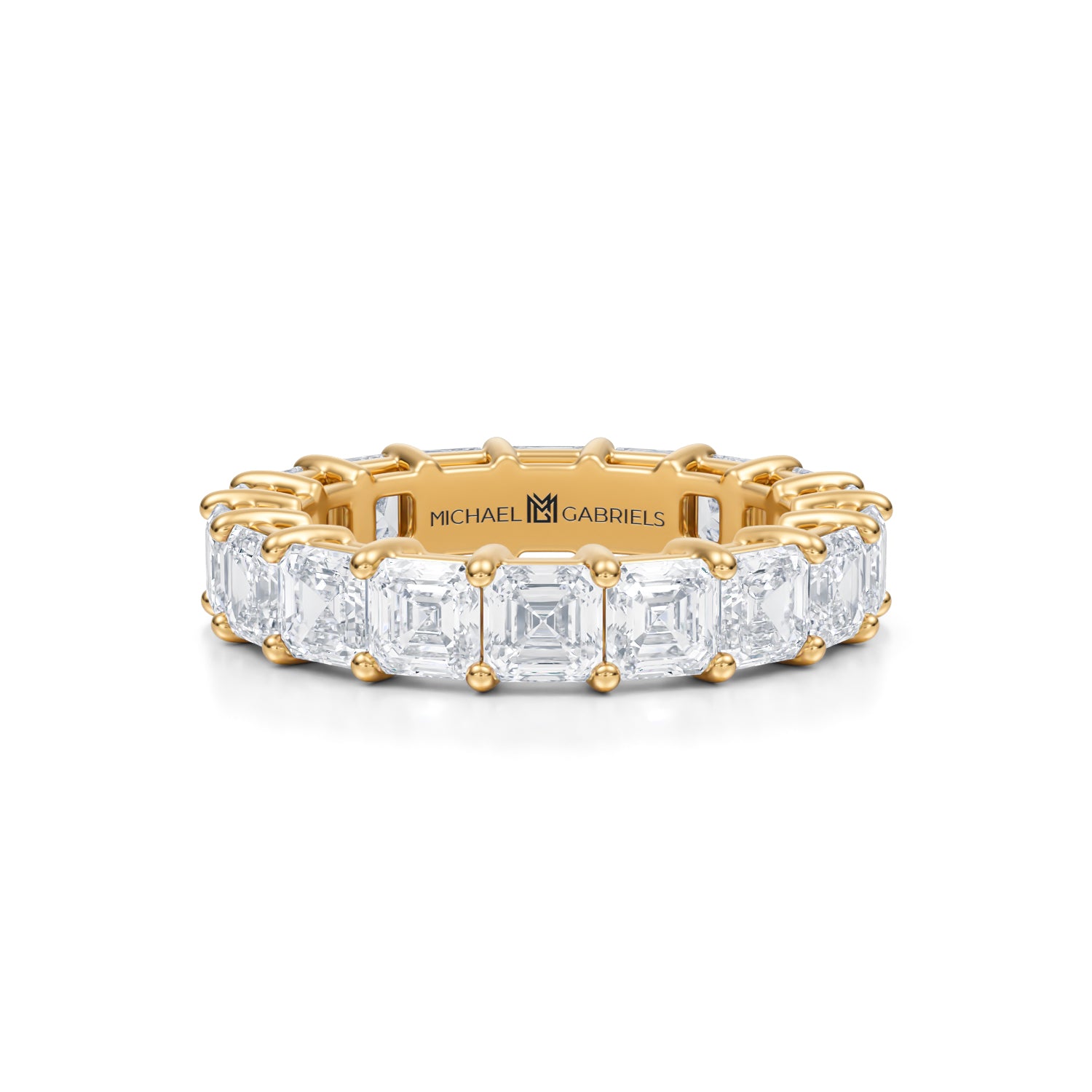 Yellow gold eternity band with Asscher cut lab grown diamonds.