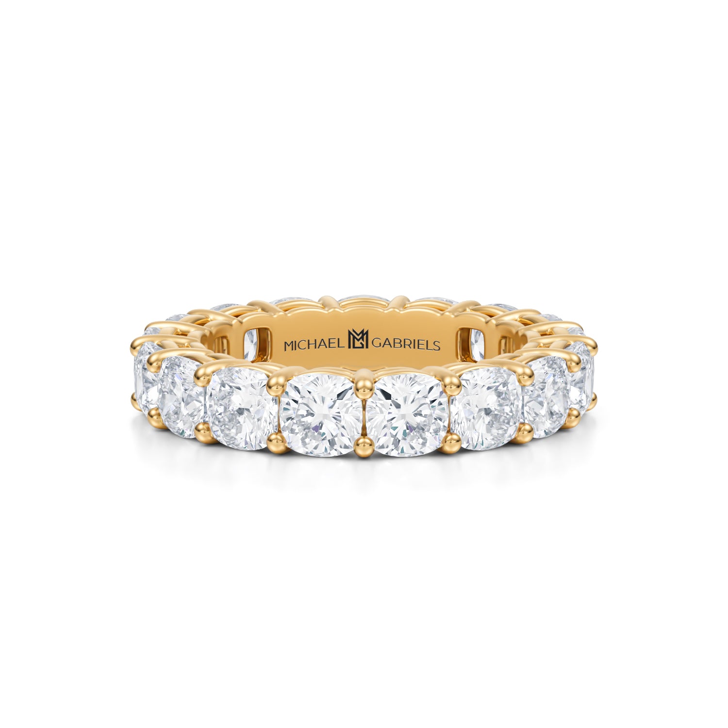 Yellow gold eternity band with cushion cut lab grown diamonds.