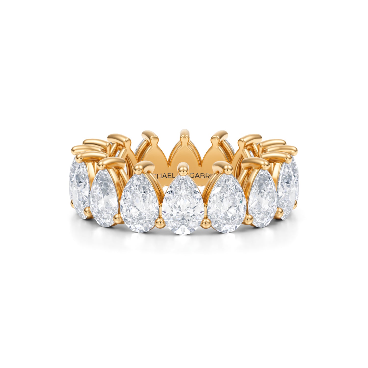 Yellow gold eternity band with vertical pear lab-grown diamonds.