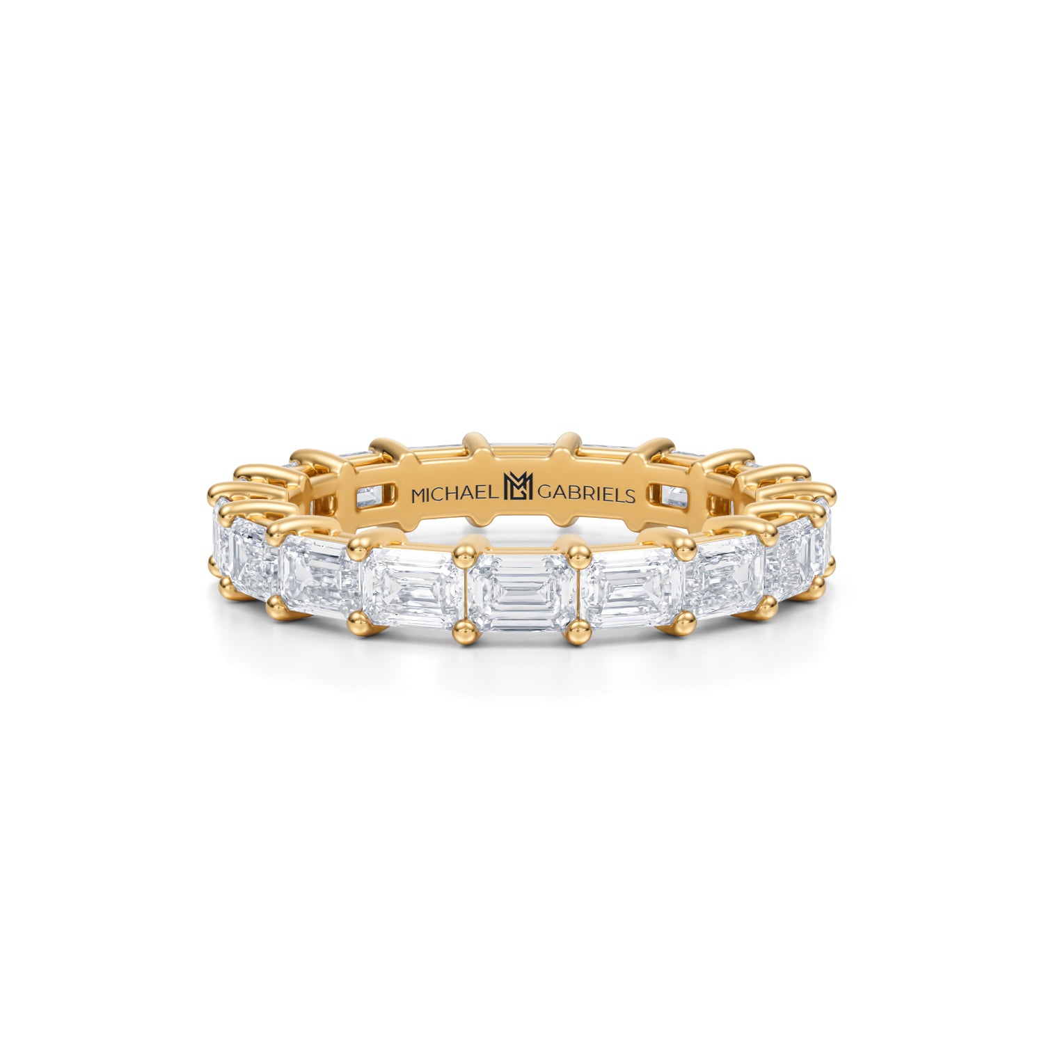 Petite eternity band with lab-grown emerald diamonds in yellow gold.