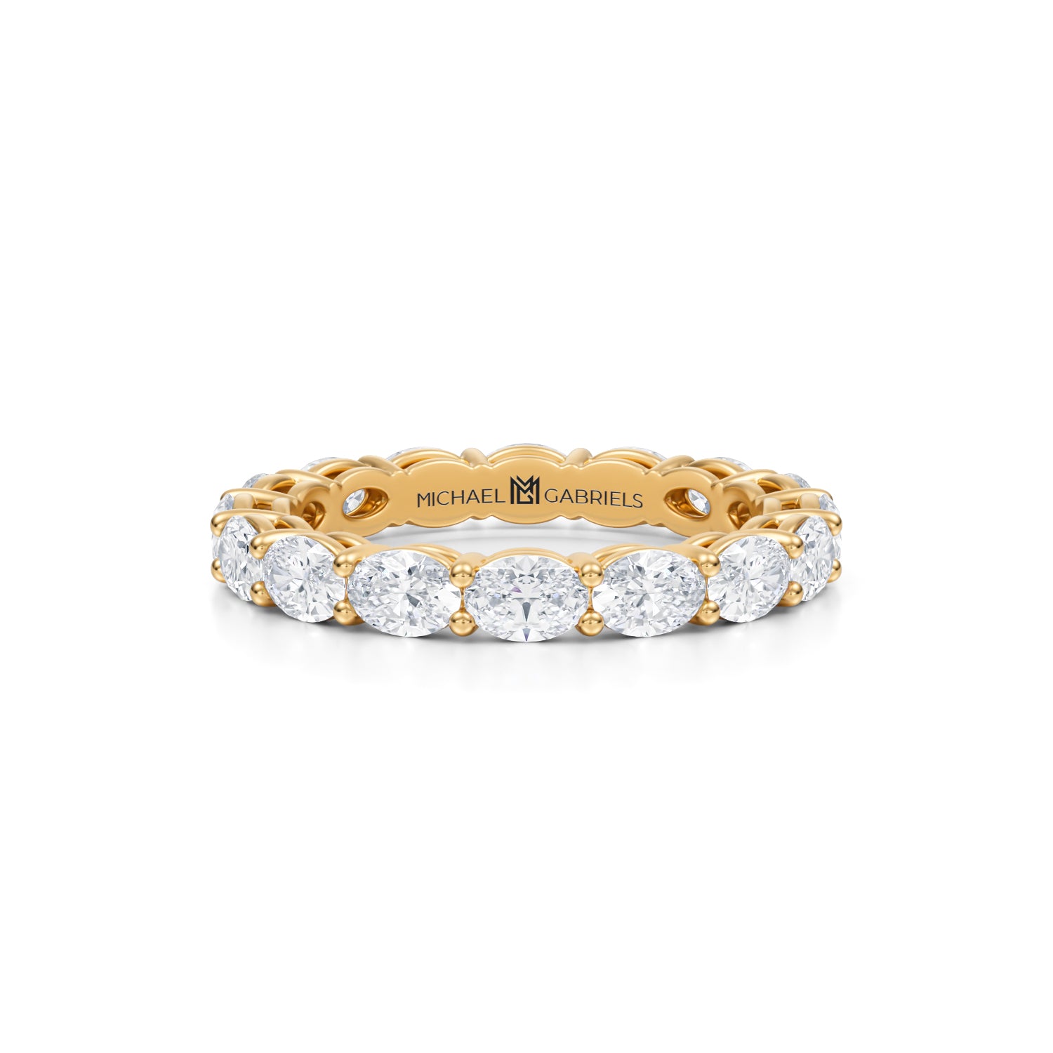 Petite lab-grown diamond eternity band in yellow gold.