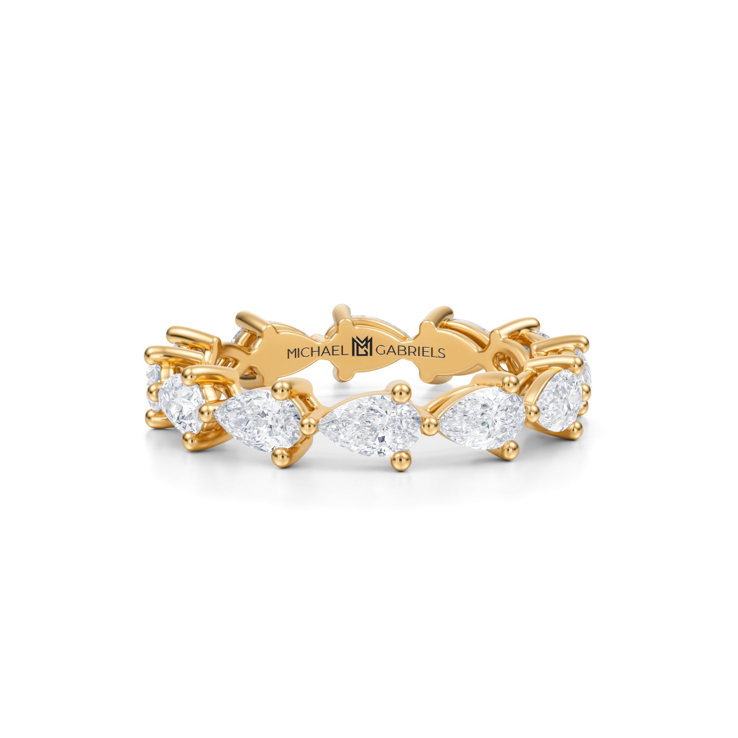 Small lab-grown diamond eternity band in yellow gold.